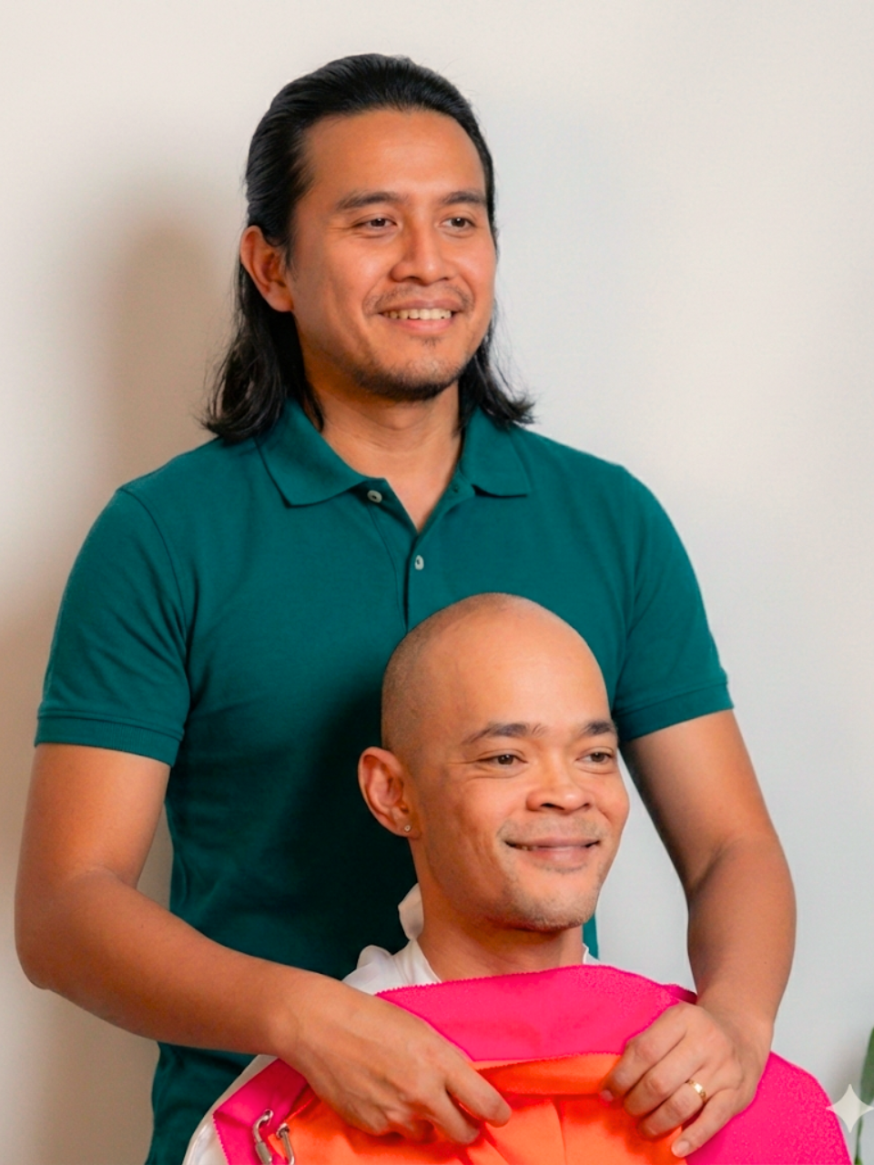 Colour analysis draping session — gold fabric swatch held against skin